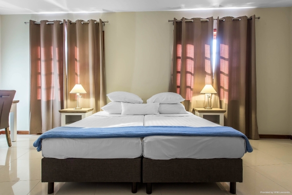 an Ascend Hotel Collection Member ACOYA Hotel Suites & Villas
